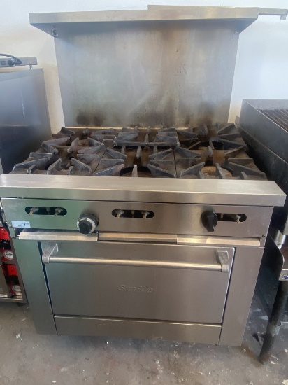 Sun fire six burner Range with oven and Overshelf - Missing a ring and some tops do not match