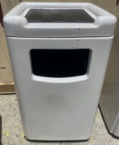 Trash receptacle with top tray holder