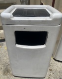Trash receptacle with top tray holder