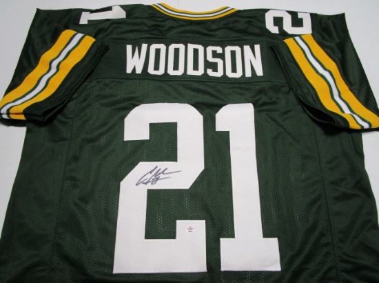 Charles Woodson of the Green Bay Packers signed autographed football jersey PAAS COA 278