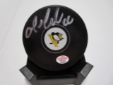 Mario Lemieux of the Pittsburgh Penguins signed autographed logo hockey puck PAAS COA 397