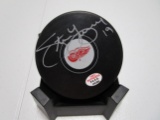 Steve Yzerman of the Detroit Red Wings signed autographed logo hockey puck PAAS COA 295
