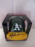 Rickey Henderson of the Oakland A's signed autographed mini batting helmet PAAS COA 105