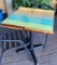 24in x 24 in wood tables resin tops on metal bases