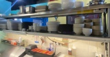 9 foot stainless steel double over shelf with 48 inch heat lamp and two dupe racks