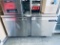 Continental 60 in two door under counter stainless steel refrigerated work table mounted on casters