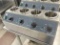 Carnival King heated condiment rail holds four condiment bottles each one with its own individual te