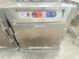 Metro C5  heated holding cabinet on casters comes with three stainless steel racks and features temp