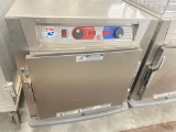 Metro C5  heated holding cabinet on casters comes with three stainless steel racks and features temp