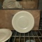 Coffee cup saucers, cream