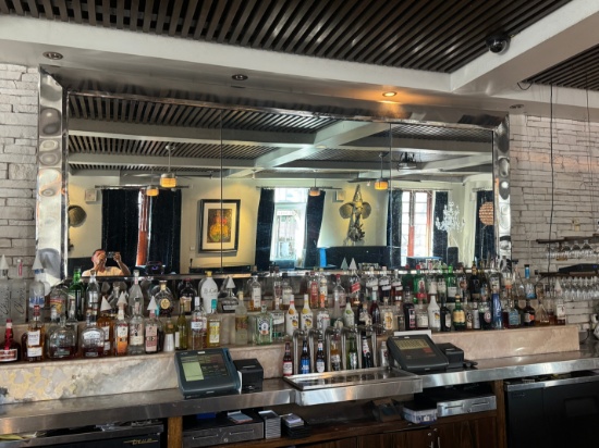 10ft wall mounted two way decorative mirror with a metal polished frame. The mirror is two way and b