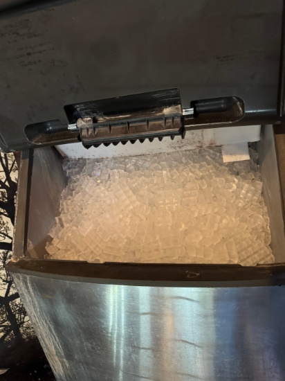 Manitowac 300lbs Indigo Ice Machine with 500lbs Stainless Steel Ice Bin. The head was just recently