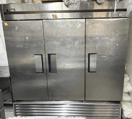 True model T 72 â€“ F  three door stainless steel freezer with nine epoxy coated adjustableshelves.