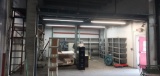 Second Floor Mezzanine Level supported by Metal Pallet Racking with Ladder needs to be deattached -