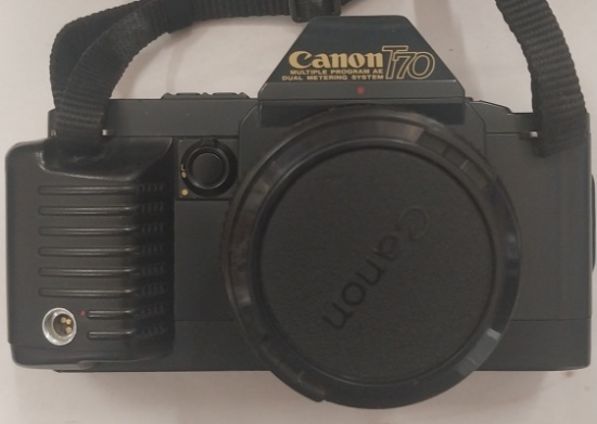 Canon T70 35mm SLR Camera with Lens, Two Rollei Flash Units and Aluminum Case