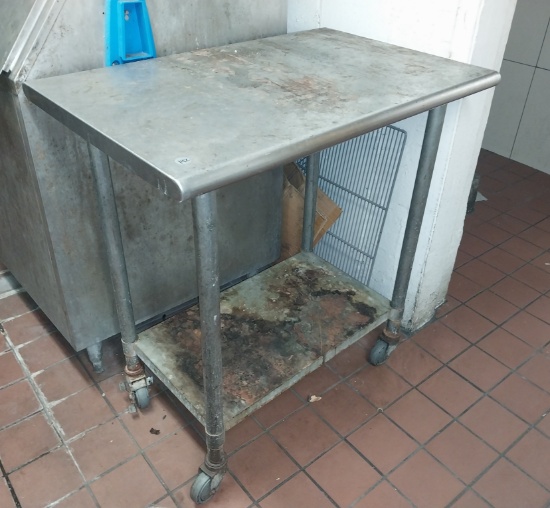 36 in Stainless steel Table on casters as is