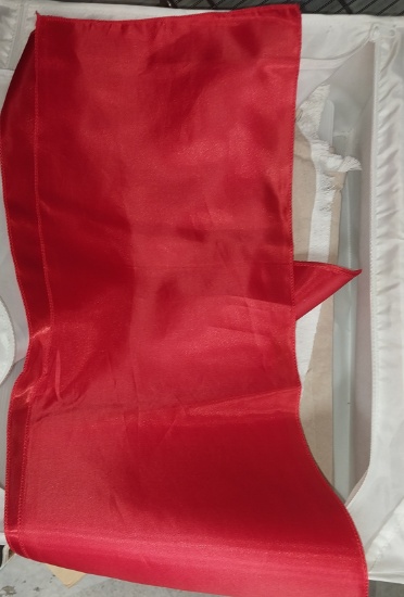 3 tan table clothes and red table runners