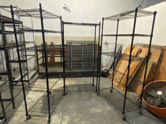 48 inch five shelf Metro shelving sections (2) of them on casters one stationary
