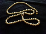 PEARL NECKLACE WITH 14KT GOLD DIAMOND & SAPPHIRE NECKLACE - 36