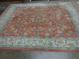 ORIENTAL  STYLE RUG: ROSE GROUND WITH GRAPE AND LEAF DESIGN (7' X 10')