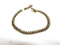 LADIES 10KT YELLOW GOLD AND DIAMOND TENNNIS BRACELET (5.6 DWT)