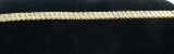 LADIES DIAMOND AND 10KT YELLOW GOLD TENNIS BRACELET (12.3 DWT)