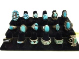 TRAY OF 18 SILVER AND TURQUOISE RINGS, CHOICE