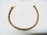 14KT YELLOW GOLD AND DIAMOND TENNIS BRACELET