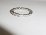 10 KT WHITE GOLD AND DIAMOND RING CONTAINING
