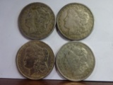 (4) CIRCULATED MORGAN SILVER DOLLARS: 1900, 1900-O, (2) 1921-S