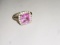 LADIES 10KT WHITE GOLD FASHION RING WITH EMERALD CUT PINK STONE