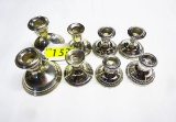 4 PAIRS OF WEIGHTED STERLING SILVER CANDLESTICKS