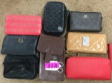 (9) ASSORTED WOMAN'S WALLETS INCLUDING COACH AND MK