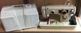 WHITE BRAND VINTAGE SEWING MACHINE WITH CARRY CASE