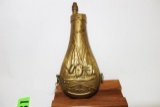 BRASS POWDER FLASK, ORIGINAL EARLY WITH MILITARY MOTIF, MADE IN ITALY