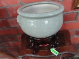 PAIR OF CHINESE CELEDON PLANTERS WITH STANDS