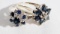 2 LADIES 14 KT WHITE GOLD AND SAPPHIRE RINGS EACH IN A FLOWER PATTERN