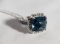LADIES 14KT WHITE GOLD FASHION RING WITH CUSHION CUT BLUE STONE