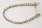 14KT YELLOW GOLD AND DIAMOND TENNIS BRACELET