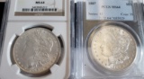 (2) GRADED MORGAN SILVER DOLLARS