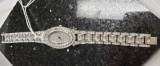 LADIES PEUGEOT WATCH #4561, CRYSTAL BAND, BEZEL AND WATCH FACE