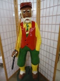 CARVED AND PAINTED WOODEN GOLFER