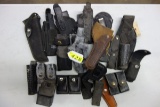 LARGE LOT OF PISTOL HOLSTERS AND MAG HOLDERS