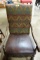 LEATHER AND UPHOLSTRY ARM CHAIR WITH CARVED ARMS AND LEGS
