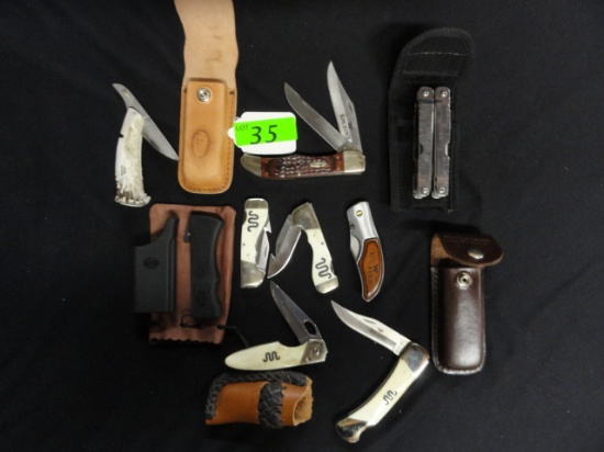 (9)  "RUNNING W" KING RANCH FOLDING KNIVES: