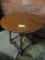 ANTIQUE ROUND SIDE TABLE WITH SHAPED SKIRT AND TURNED LEGS