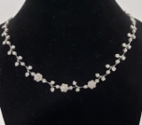 14KT WHITE GOLD AND DIAMOND NECKLACE.