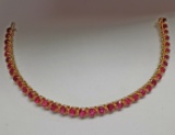 14KT YELLOW GOLD AND RUBY BRACELET