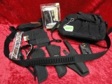 LOT OF HOLSTERS AND ACCESSORIES