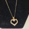14KT YELLOW GOLD AND DIAMOND HEART PENDANT ON 14KT YELLOW GOLD CHAIN